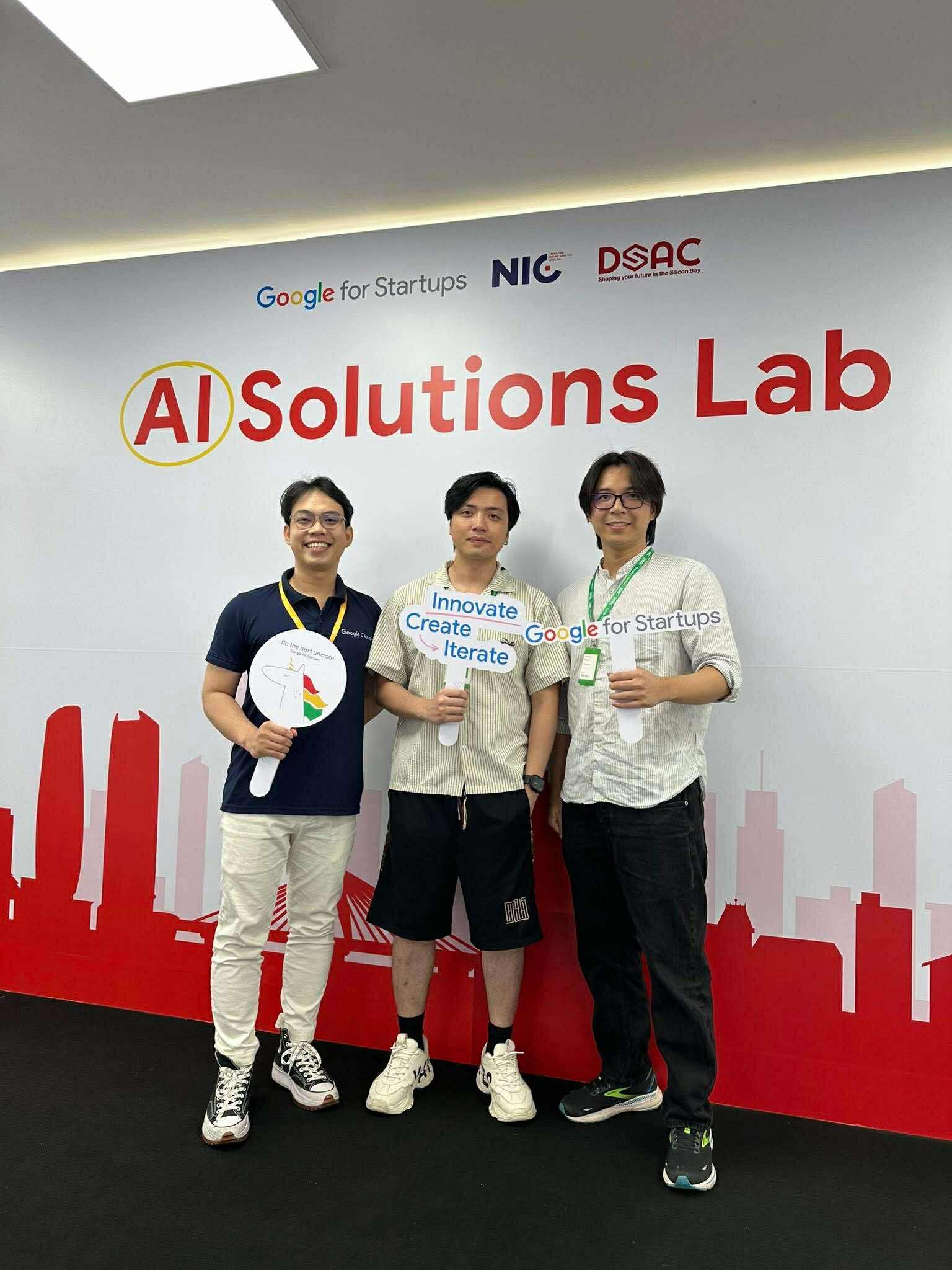 Team photo with event organizers